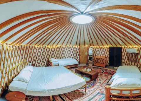 Yurt 6 | Premium bedding, memory foam beds, in-room safe, individually decorated