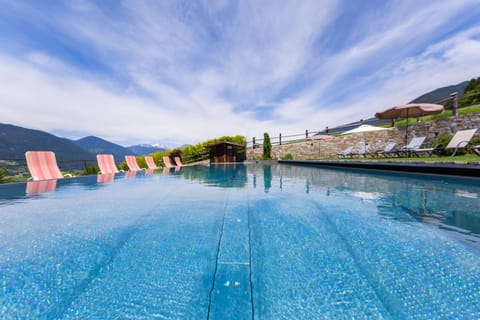 Indoor pool, seasonal outdoor pool, pool umbrellas, sun loungers