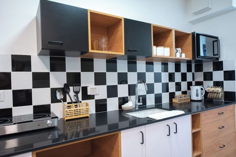 Apartment, 2 Bedrooms, Balcony | Private kitchen | Fridge, microwave, stovetop, espresso maker