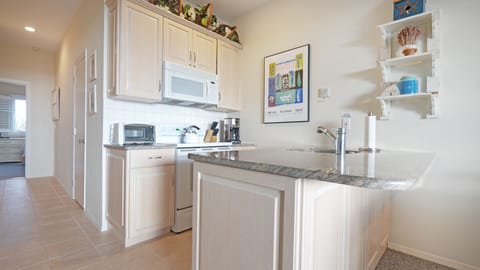 Condo | Private kitchen | Full-size fridge, microwave, oven, stovetop