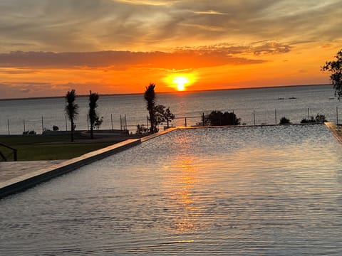 Outdoor pool, pool umbrellas, sun loungers