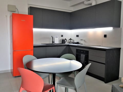 Comfort Apartment, Balcony, City View | Private kitchen | Full-size fridge, oven, stovetop, dishwasher