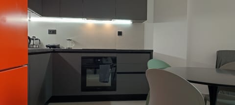 Comfort Apartment, Balcony, City View | Private kitchen | Full-size fridge, oven, stovetop, dishwasher