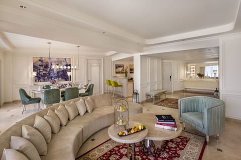 Presidential Suite | Living area | 55-inch flat-screen TV with satellite channels