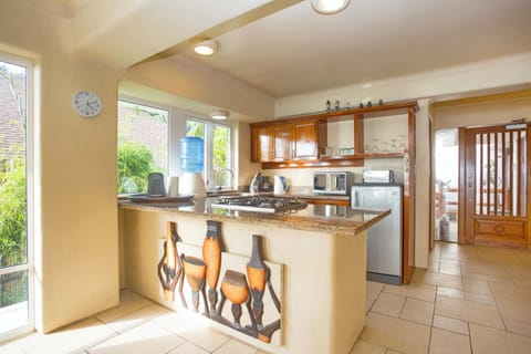 Villa | Private kitchen | Mini-fridge, oven, cookware/dishes/utensils