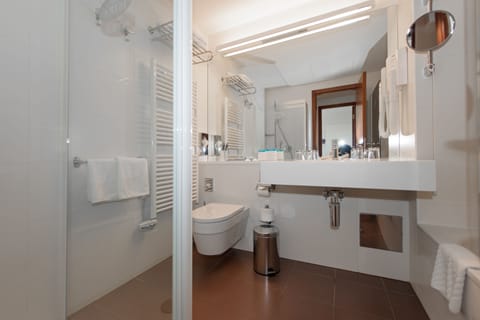 Premium Suite, Balcony, Sea View | Bathroom | Separate tub and shower, rainfall showerhead, free toiletries