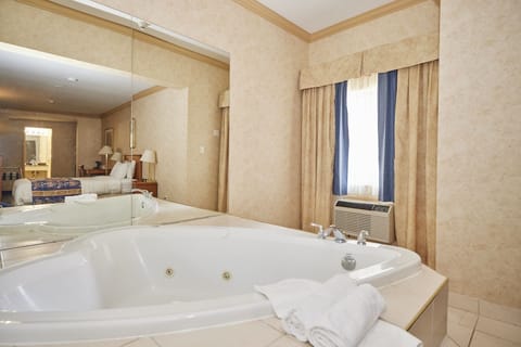 Deluxe Room, 1 Queen Bed, Non Smoking, Jetted Tub | Desk, laptop workspace, blackout drapes, iron/ironing board