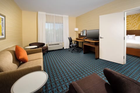 Suite, 1 Bedroom (Hearing Accessible) | In-room safe, desk, laptop workspace, iron/ironing board