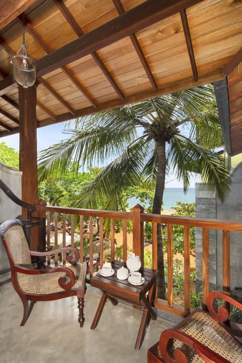 Deluxe Triple Balcony side seaview | Terrace/patio