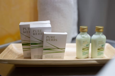 Eco-friendly toiletries, hair dryer, towels