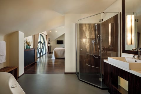 Skyline Suite with City View | Bathroom | Eco-friendly toiletries, hair dryer, towels