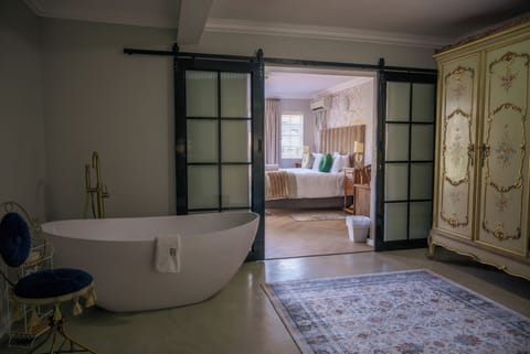 Luxury Double or Twin Room, Patio, Ground Floor | Bathroom | Hair dryer, soap, shampoo, toilet paper