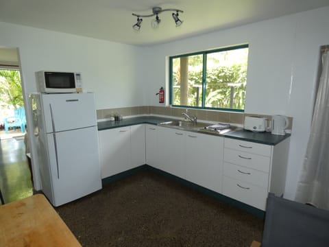 Apartment | Private kitchen | Full-size fridge, microwave, stovetop, coffee/tea maker