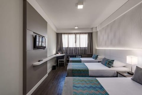 Standard Triple Room, 3 Twin Beds | Minibar, in-room safe, individually decorated, individually furnished