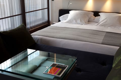 Suite, Terrace | Minibar, in-room safe, soundproofing, free WiFi