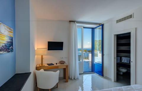 Premium Room, 1 King Bed, Hot Tub, Sea View | Down comforters, minibar, in-room safe, desk