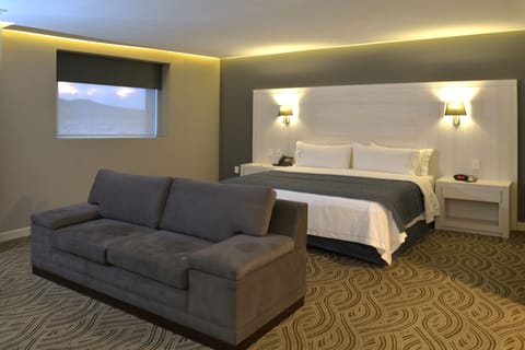 Suite, 1 King Bed | 1 bedroom, in-room safe, desk, blackout drapes