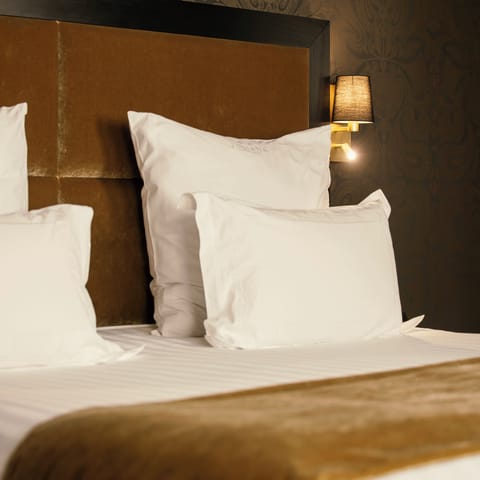 Deluxe Room | Premium bedding, minibar, in-room safe, individually decorated