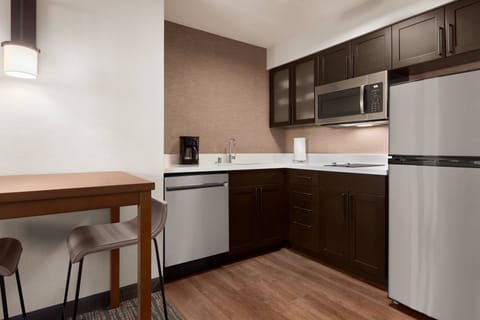 Studio, 1 King Bed, Non Smoking | Private kitchen | Fridge, microwave, stovetop, dishwasher