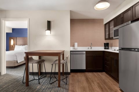 Suite, 1 Bedroom | Desk, laptop workspace, blackout drapes, iron/ironing board