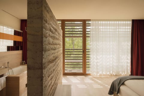 Hypo-allergenic bedding, down comforters, minibar, in-room safe