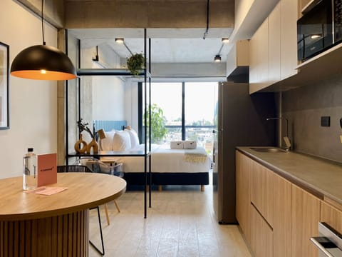 Design Apartment | Private kitchen | Full-size fridge, microwave, oven, stovetop