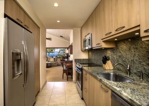 Family Studio, Ocean View | Private kitchen | Fridge, coffee/tea maker, highchair