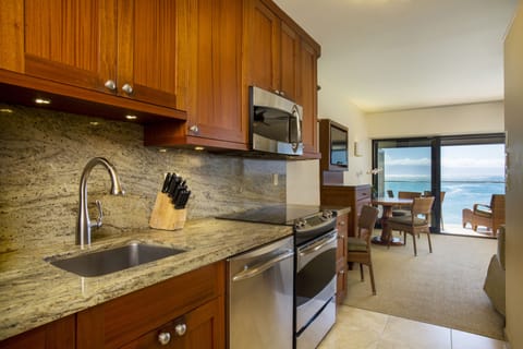 Suite, 1 Bedroom, Oceanfront | Private kitchen | Fridge, coffee/tea maker, highchair