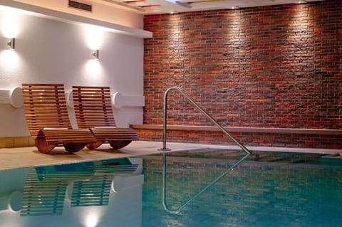 Indoor pool, open 7:00 AM to 8:00 PM, sun loungers