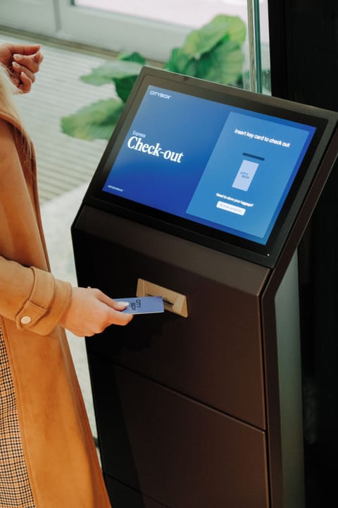 Check-in/check-out kiosk