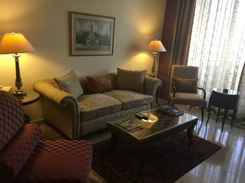 The Lalit Executive Suite | Living area | 32-inch LCD TV with satellite channels, TV