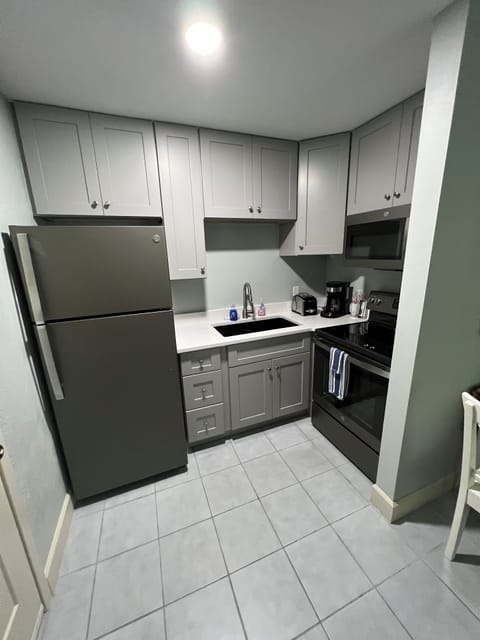 Family Suite, 1 Bedroom, Kitchen (Tarpon Cottage) | Private kitchen | Full-size fridge, microwave, coffee/tea maker, toaster