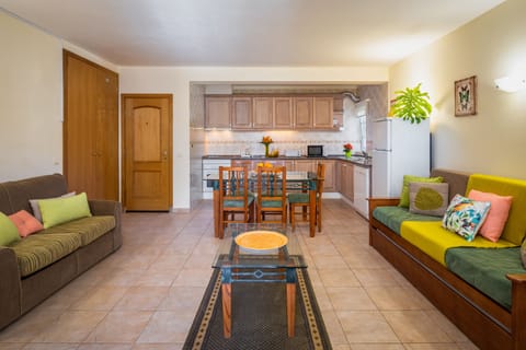 Comfort Apartment, 2 Bedrooms | Private kitchen | Full-size fridge, microwave, stovetop, coffee/tea maker