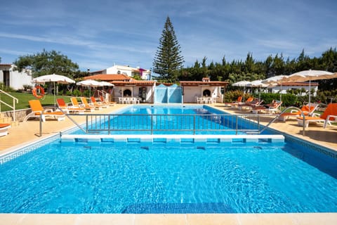 2 outdoor pools, open 8 AM to 10 PM, pool umbrellas, sun loungers