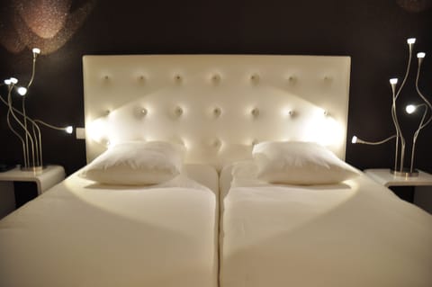 Twin Room | Desk, blackout drapes, soundproofing, iron/ironing board