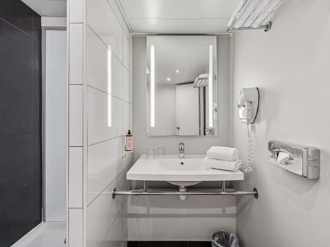 Eco-friendly toiletries, hair dryer, towels, soap