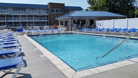 Seasonal outdoor pool, open 9:00 AM to 9:00 PM, sun loungers