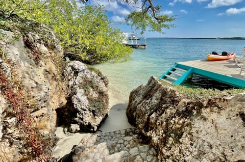 Private beach, white sand, sun loungers, beach umbrellas