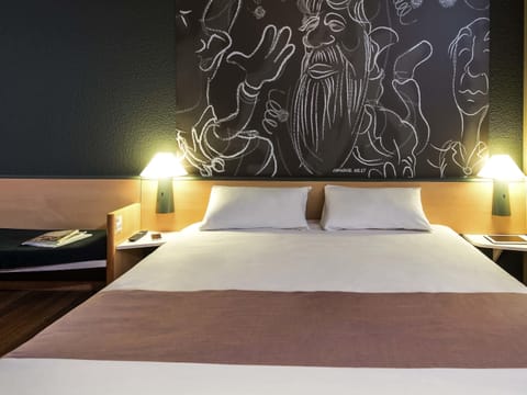 Down comforters, desk, blackout drapes, iron/ironing board