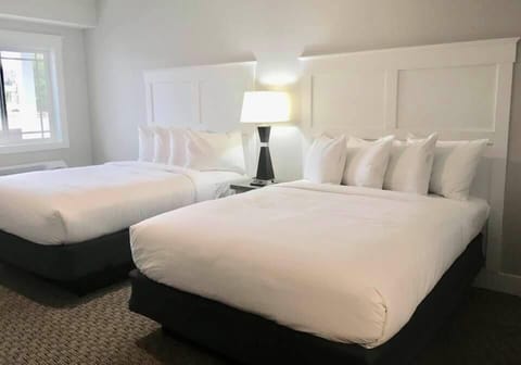 Deluxe, 2 Queen Beds | Desk, free WiFi, bed sheets