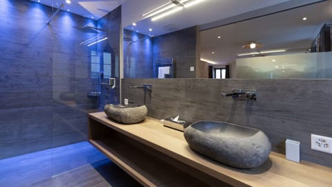 Junior Suite, Balcony | Bathroom | Hair dryer, bathrobes, towels, soap