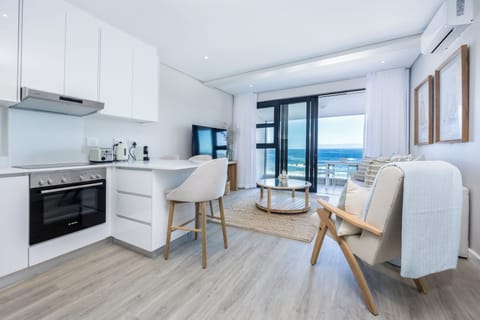 Suite, 1 Bedroom, Sea View | Private kitchen | Fridge, microwave, oven, stovetop