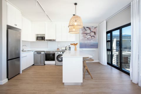 Luxury Suite, 2 Bedrooms, Partial Sea View | Private kitchen | Fridge, microwave, oven, stovetop