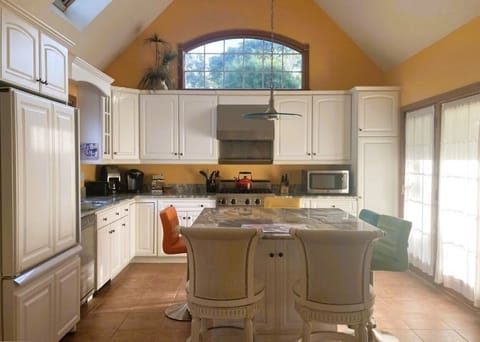 Private Yellowtail House at By the Sea Bed & Breakfast | Private kitchen | Microwave, freezer