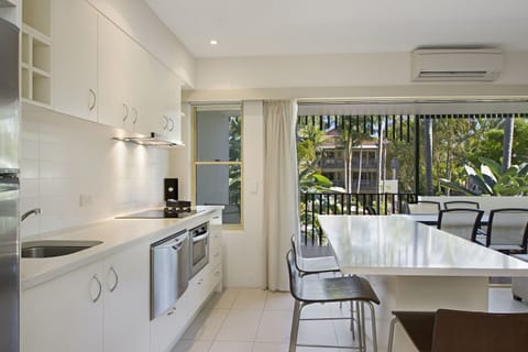 Two Bedroom Deluxe Apartment | Private kitchen | Fridge, microwave, stovetop, coffee/tea maker