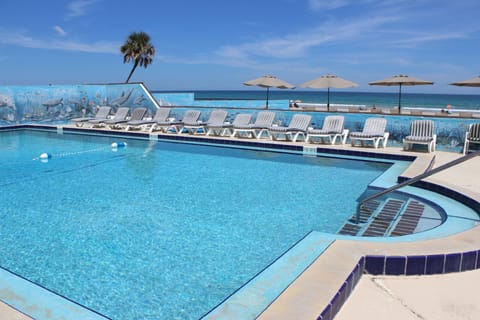 Outdoor pool, open 8:00 AM to 10:00 PM, pool umbrellas, sun loungers