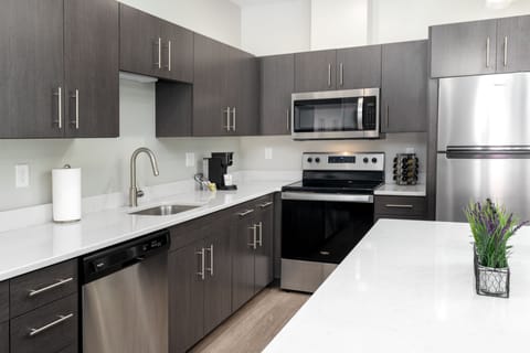 Design Apartment | Private kitchen | Full-size fridge, microwave, oven, stovetop