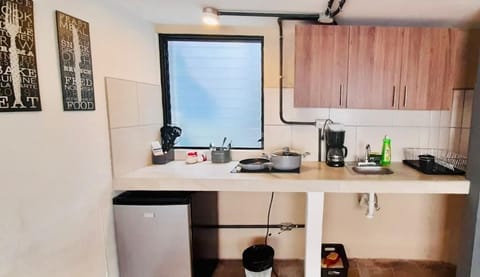 Comfort Apartment | Private kitchen | Microwave, coffee/tea maker