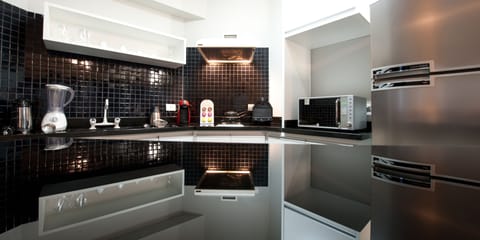 Elite Double Room | Private kitchen | Full-size fridge, microwave