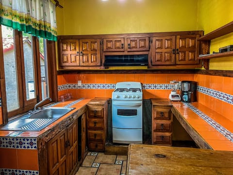 Cabin, 3 Bedrooms, Fireplace | Private kitchen | Full-size fridge, stovetop, dishwasher, cookware/dishes/utensils